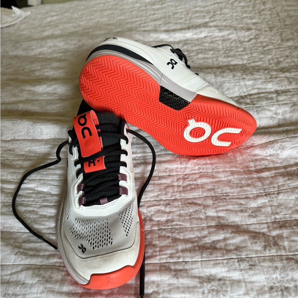 On Running Black and Red Sneakers